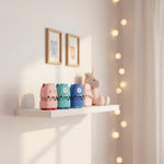 All four Monster Nest character stamps standing in a row — kids name stamps by Parent Nest