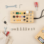 Top-down flat lay of Large PowerBoard with tools and screws — kids STEM toy