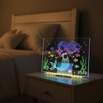 Glow Nest LED board glowing with colourful artwork — kids light-up drawing board