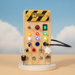 Large PowerBoard hero product shot — wooden LED busy board by Parent Nest